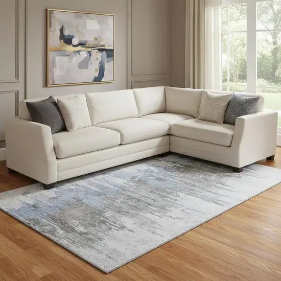 Blue Gray And Ivory Abstract Washable Area Rug With UV Protection Photo 1