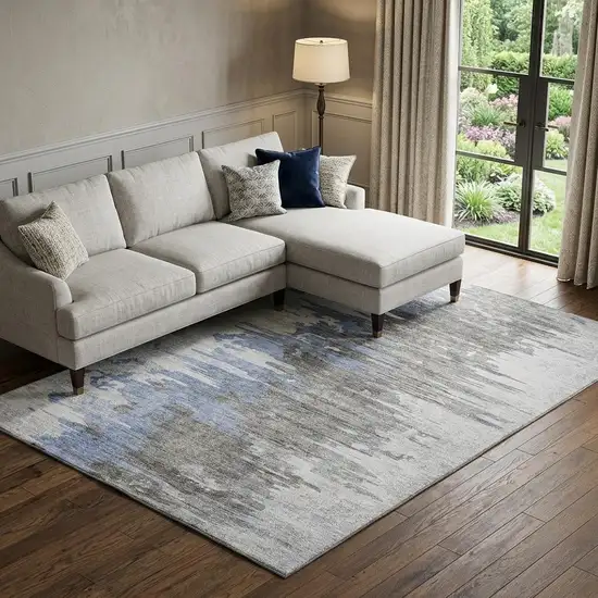 Blue Gray And Ivory Abstract Washable Area Rug With UV Protection Photo 1