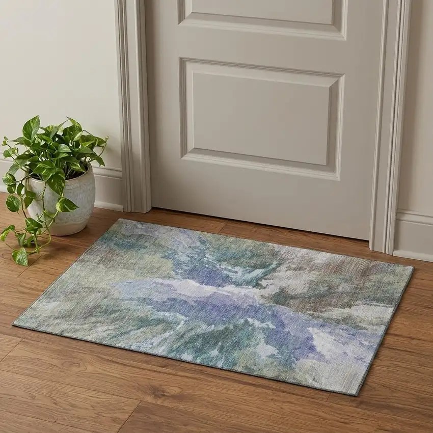Blue Gray And Ivory Abstract Washable Area Rug With UV Protection Photo 1