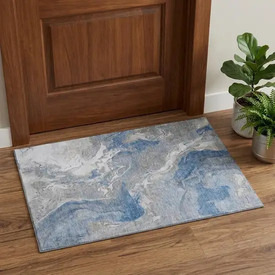 Blue Gray And Ivory Abstract Washable Area Rug With UV Protection Photo 1