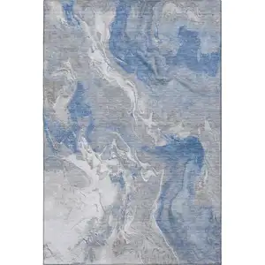 Photo of Blue Gray And Ivory Abstract Washable Area Rug With UV Protection