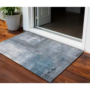 Photo of Blue Gray And Ivory Abstract Washable Indoor Outdoor Area Rug