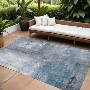 Photo of Blue Gray And Ivory Abstract Washable Indoor Outdoor Area Rug
