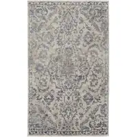 Photo of Blue Gray And Ivory Floral Power Loom Distressed Area Rug