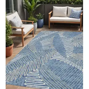 Photo of Blue Gray And Ivory Floral Washable Indoor Outdoor Area Rug