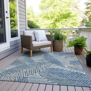 Photo of Blue Gray And Ivory Floral Washable Indoor Outdoor Area Rug