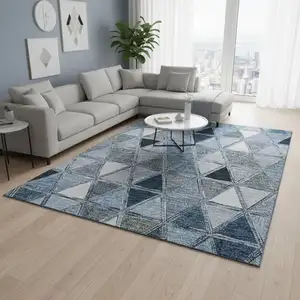 Photo of Blue Gray And Ivory Geometric Washable Area Rug With UV Protection