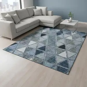 Photo of Blue Gray And Ivory Geometric Washable Area Rug With UV Protection