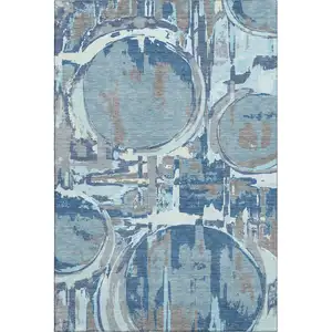 Photo of Blue Gray And Ivory Geometric Washable Area Rug With UV Protection