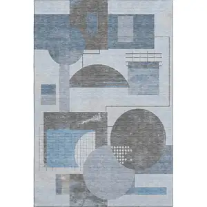 Photo of Blue Gray And Ivory Geometric Washable Area Rug With UV Protection