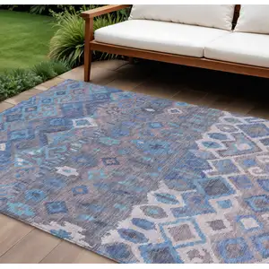 Photo of Blue Gray And Ivory Geometric Washable Indoor Outdoor Area Rug