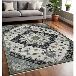 Photo of Blue Gray And Ivory Medallion Area Rug With Fringe