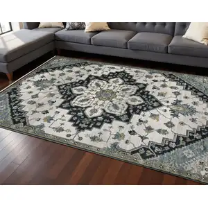 Photo of Blue Gray And Ivory Medallion Area Rug With Fringe