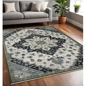Photo of Blue Gray And Ivory Medallion Area Rug With Fringe