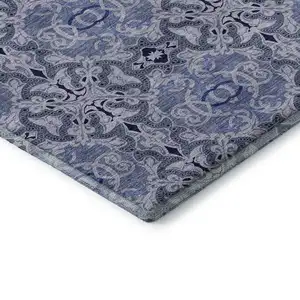 Photo of Blue Gray And Ivory Medallion Washable Area Rug With UV Protection