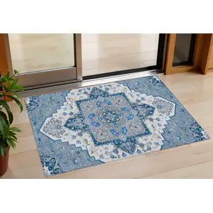 Photo of Blue Gray And Ivory Oriental Washable Indoor Outdoor Area Rug