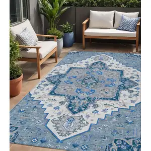 Photo of Blue Gray And Ivory Oriental Washable Indoor Outdoor Area Rug