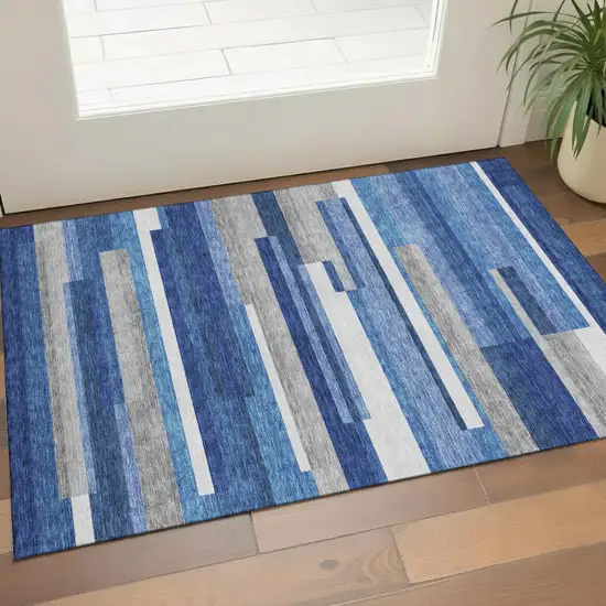 Blue Gray And Ivory Striped Washable Area Rug With UV Protection Photo 1