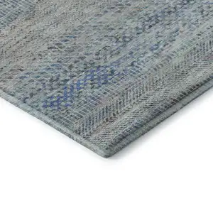 Photo of Blue Gray And Ivory Striped Washable Area Rug With UV Protection
