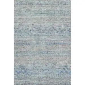 Photo of Blue Gray And Ivory Striped Washable Area Rug With UV Protection