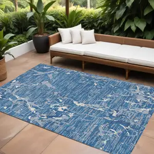 Photo of Blue Gray And Ivory Striped Washable Indoor Outdoor Area Rug