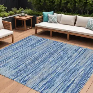 Photo of Blue Gray And Ivory Striped Washable Indoor Outdoor Area Rug
