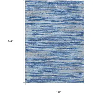 Photo of Blue Gray And Ivory Striped Washable Indoor Outdoor Area Rug