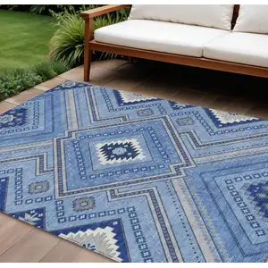 Photo of Blue Gray And Ivory Tribal Washable Indoor Outdoor Area Rug