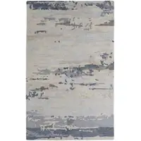 Photo of Blue Gray And Ivory Wool Abstract Tufted Handmade Stain Resistant Area Rug