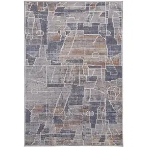 Photo of Blue Gray And Orange Geometric Power Loom Stain Resistant Area Rug