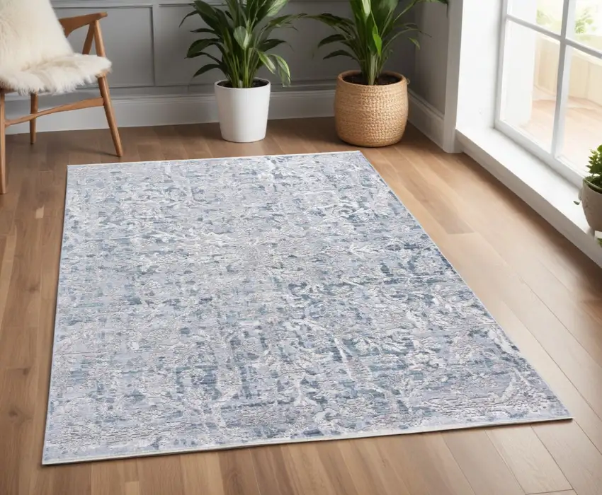 Blue and Gray Abstract Distressed Area Rug With Fringe Photo 1