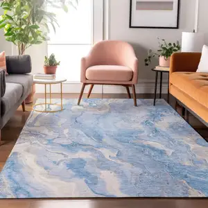 Photo of Blue Gray And Silver Abstract Washable Area Rug With UV Protection