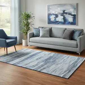 Photo of Blue Gray And Silver Abstract Washable Area Rug With UV Protection