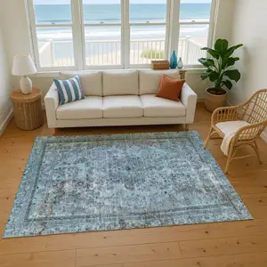 Photo of Blue Gray And Silver Floral Medallion Washable Area Rug With UV Protection