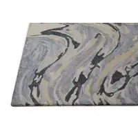 Photo of Blue Gray And Taupe Abstract Tufted Handmade Area Rug