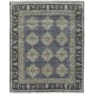 Photo of Blue Gray And Taupe Wool Floral Hand Knotted Stain Resistant Area Rug