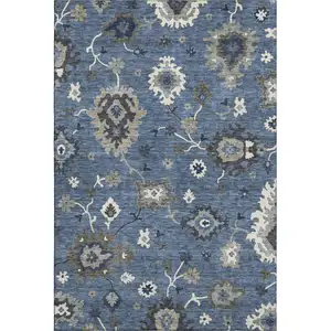 Photo of Blue Gray And White Floral Medallion Washable Area Rug With UV Protection