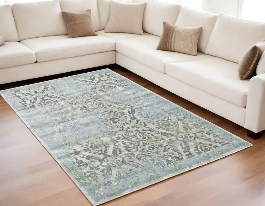 Blue Gray and Green Floral Power Loom Worn Faded Area Rug Photo 1