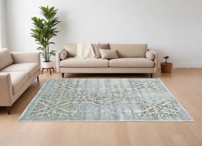 Blue Gray and Green Floral Power Loom Worn Faded Area Rug Photo 1