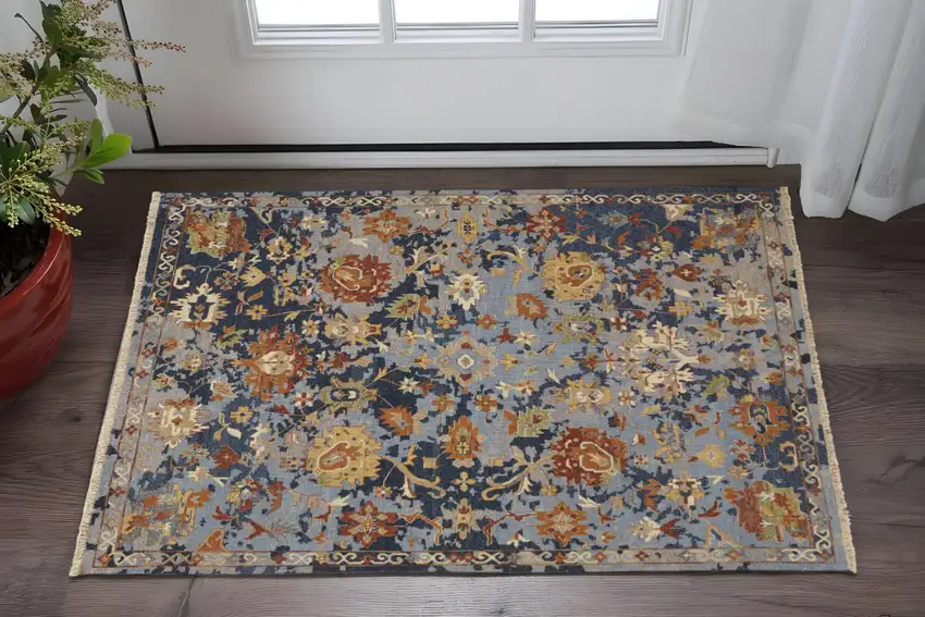 Blue Gray and Red Wool Floral Hand Knotted Area Rug With Fringe Photo 1
