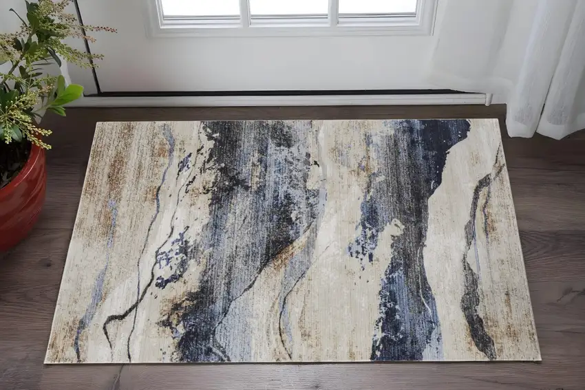 Blue Gray and Tan Abstract Power Loom Area Rug Photo 1