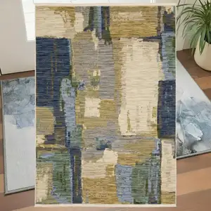 Photo of Blue Green And Beige Abstract Area Rug With Fringe
