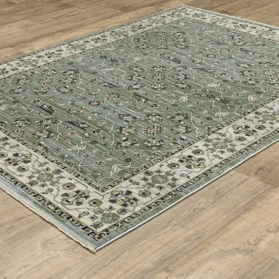 Blue Green And Beige Floral Area Rug With Fringe Photo 2