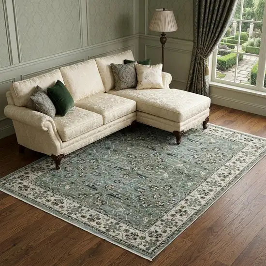 Blue Green And Beige Floral Area Rug With Fringe Photo 1
