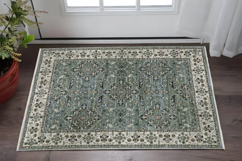 Blue Green And Beige Floral Area Rug With Fringe Photo 1