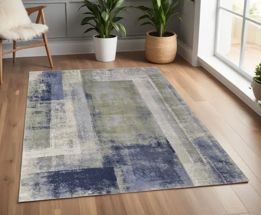 Blue and Ivory Abstract Power Loom Distressed Area Rug Photo 1