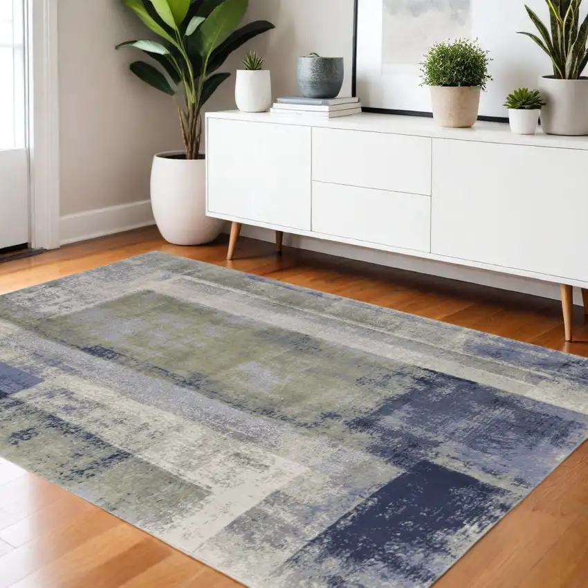 Blue Green And Ivory Abstract Distressed Area Rug Photo 1