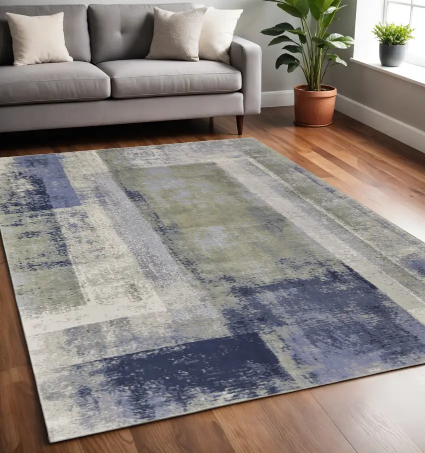 Blue and Ivory Abstract Power Loom Distressed Area Rug Photo 1