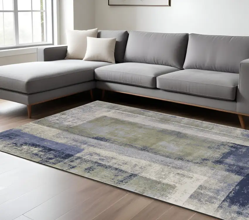 Blue and Ivory Abstract Power Loom Distressed Area Rug Photo 1