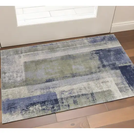 Blue Green And Ivory Abstract Distressed Area Rug Photo 1